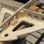 Blocks essential to bond nose, tail plates to stringer